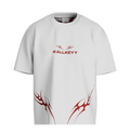 Front view of MRITYO-BADDHA oversized graphic tee in premium off-white featuring red KALLKEYY typography branding and red tribal flame accents along the bottom.