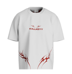 Front view of MRITYO-BADDHA oversized graphic tee in premium off-white featuring red KALLKEYY typography branding and red tribal flame accents along the bottom.